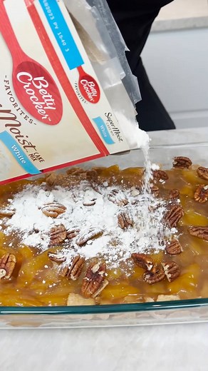 Cinnamon Toast Crunch Dump Cake Cinnamon Toast Crunch 2 Cans Peach Pie Filling Pecans White Cake Mix 1 1/2 Sticks Butter Preheat oven to 350º. Add cinnamon toast crunch to base of dish and pour over peach pie filling. Next add pecans, white cake mix and thinly sliced butter. Bake for 45 minutes. Enjoy! | Definitely Not Gourmet