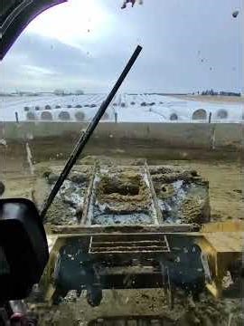 Scraping out the freestall barn