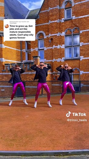 Guy Performing Dance Moves in Pink High Heels