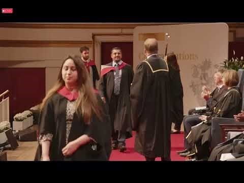 Walking across the stage at my graduation ceremony