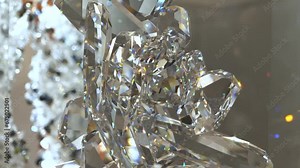 4k orbit around sparkling crystal sculpture with bright colorful lights reflecting on it with more crystals in the background visible while moving