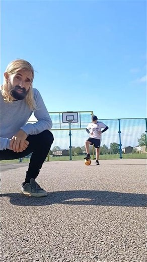 Could you curl a football around a moving Target?