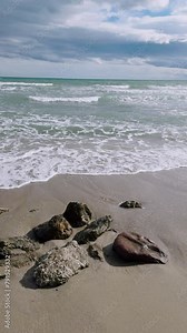 Province of Castellon. Favorite place for active walks. Mediterranean coast on a sunny day in spring. Sun glare on azure sea water. VIA VERDE BENICASIM OROPESA. Spain