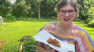 Kalea Hall, auto writer, tries Chevy's apple pie hot dog