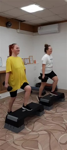 Step Exercise Routine with Dumbbells for Fitness