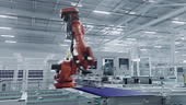 Orange Industrial Robot Arm Assembles Solar Panel, Placing PV Cells....