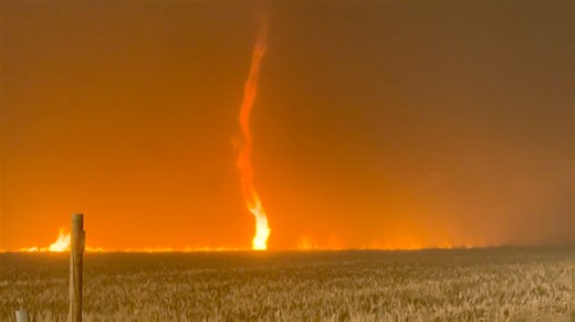 MASSIVE WILDFIRE with fire whirls threatening Englewood, Kansas with 50-70 mph winds! Winds appear to be shifting more westerly. Firefighters battling flames on north side of town near the post office. Another fire is threatening Howardwick, Texas. Red flag warning continues with extremely critical fire conditions #fire #firenado #fireweather | Reed Timmer Extreme Meteorologist