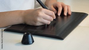 Hands on a graphic tablet, drawing and writing through the help of technology. Stock Video