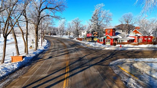 Crisp, clear February mornings in Detroit Lakes can be beautiful. This morning's flight followed West Lake Drive along the mile-long beach, where frost-covered trees shimmer in the early light. Ice houses are scattered across the frozen lake like a winter village, before the view turns toward downtown as the day begins. Pure Minnesota winter at its finest. #DetroitLakes #DetroitLakesMN #VisitDetroitLakes #WestLakeDrive #MinnesotaWinter #IceFishingMN #IceHouses #DroneVideo #DronePhotography #Lake
