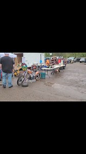 Outdoor minibike swap meet. It had rained to beat the band all night long and into the morning. Dan. #minibike | All About Mini Bikes