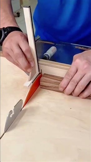 carving detailed dragon scale patterns into a large wooden sculpture with a sharp chisel tool