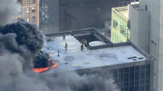 Flames leap from Manhattan high-rise fire