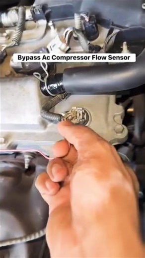 AC compressor flow sensor bypass from camshaft sensor