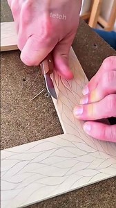 Intricate Wood Carving Process Creating Elegant Wave Patterns on a Custom Picture Frame