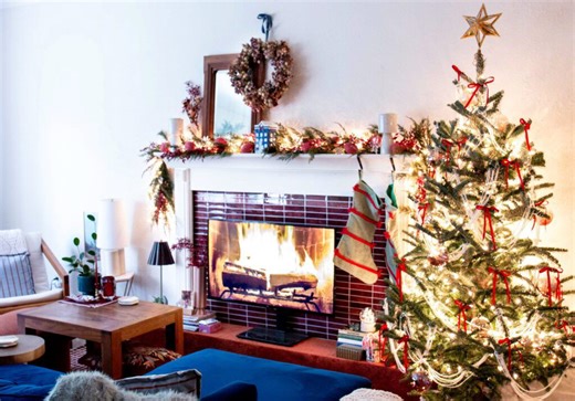 Woman transforms her living room with DIY faux fireplace – all for under $200