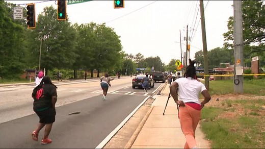 Crowd runs toward scene following Fulton County police shooting that left man dead