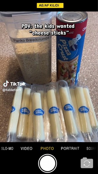 The kids wanted cheese sticks and this is what I had in the fridge! Turned out amazing and so easy and big family budget friendly! Ingredients: String cheese Panko bread crumbs Pillsbury pizza crust Directions: Cut string cheese in half Cut pizza crust into rectangles Wrap string cheese in pizza crust Roll in panko Fry in either a deep fryer or in a frying pan of oil for about 2 -3 minutes!! ENJOY!!!! @Pillsbury #food #cheese #snack #kids #dinner