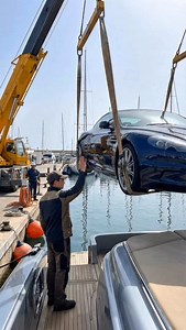 23K views · 148 reactions | Car Unloading from a Yacht Goes Wrong… Crane Fails and Drops It Into the Sea At the port, workers are lifting a car off a yacht when the crane suddenly gives out. The boom swings, the car slips, and it splashes straight into the water and sinks. Everyone’s yelling the same question: who’s paying for this?! #yacht #fail #shit #supercar #what | The.worldai | Facebook