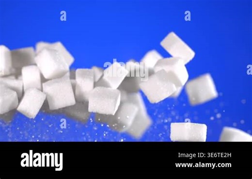 Super slow motion, White Sugar Cubes Flying Slow Motion, Crisp Closeup Against Vivid Blue Background Sparkling Stock Video Footage - Alamy