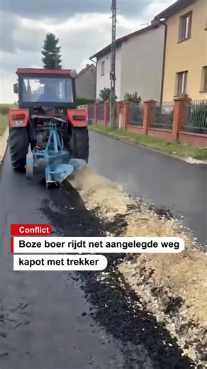 Poolse boer rijdt pas aangelegde weg kapot met trekker