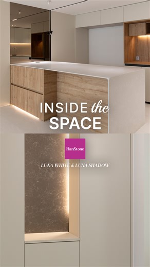 Hyundailnc_INDIA on Instagram: "Contrast in Vibes, created by the HanStone 'Luna Series'🤍🖤 The kitchen island features #Hanstone LunaWhite, creating a bright and cozy atmosphere with its soft, subtle veining. In contrast, the hallway cabinet is finished with the deep-toned #Hanstone LunaShadow, adding a striking focal point with a sense of depth. The harmony between wood textures and indirect lighting creates a truly sophisticated space. Explore how the #Hanstone e Luna Series completes every 