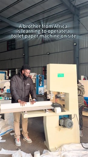 Roll paper production machine