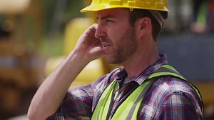 Construction Worker Talking On Cell Phone Stock Footage Video (100% Royalty-free) 7264585 | Shutterstock
