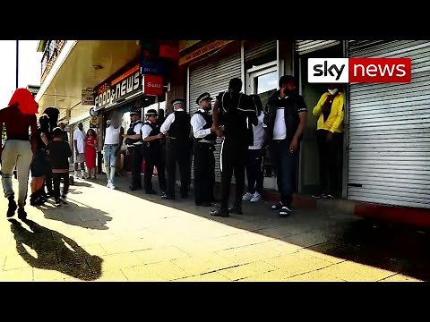 Exclusive: Crowds gather when police stop black teenagers