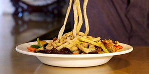 The #2 Chinese restaurant in America serves a dish made of one long noodle that brings you good luck