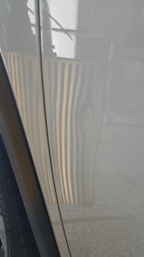 No need to remove door card. Aluminium shield slides down window. Felt back protects window. Dent removal tools then slide into position and dent is massaged out. Original factory paint is kept. 👍 Time for repair around 1 hour. 👍 Repaired at customer's house. 👍 Cost $150 👍 | Ocean Dents PDR Sunshine Coast