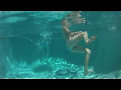 GoPro HD Camera Under Water In Swimming Pool With Family.