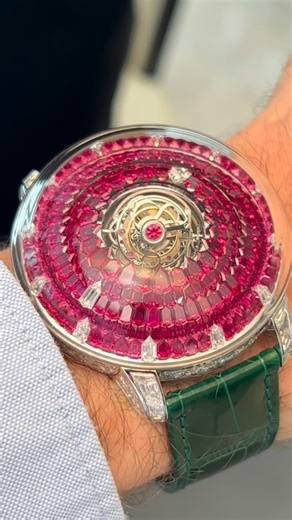 MWL - Watch Collector & Content Creator on Instagram: "⬇️⬇️CAPTION⬇️⬇️ The Jacob & Co. Mystery Tourbillon is a bold fusion of haute horlogerie and high jewelry, exemplifying the brand’s signature philosophy of using precious materials—especially rubies and diamonds—as if they were standard components. The result is a timepiece that dazzles visually while delivering serious mechanical innovation. At its core lies the manually wound JCAM32 movement, featuring 430 components, a 60-hour power reserv