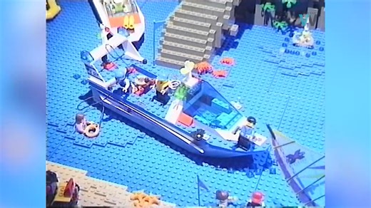 A massive crowd of children and adults amassed for a Lego truck display hosted by the old Tunza Toys shop in South City in 1999. Dwayne Carey collection | Southland's Past -Te Wāmua o Murihiku