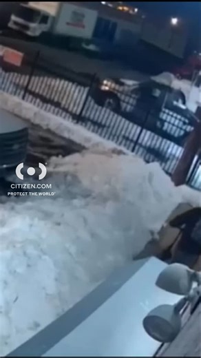 Philadelphia police released surveillance video of a robbery and shooting at a storage facility. The suspect allegedly announced a robbery, took cash, and shot the manager at least twice before fleeing. A customer inside was unharmed. The victim was hospitalized and remains in critical condition. The suspect—described as wearing a green ski mask, layered hoodies, blue jeans, and black Jordans—may have fled on an e-bike. Police urge anyone with information to call 911 and not approach the suspect