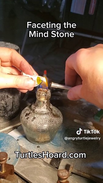 I am learning gem faceting, and for stone 7 I finally felt ready to cut something I've wanted for a long time: a mind stone cut from GAGG! I like how it came out but I'll definitely be revisiting this in the future. In the mean time all our GAGGs are on sale and yoj can check them out at the link in my bio. GAGG is a specialized kind of garnet grown for their ultrabright fluorescence which makes them useful for detecting invisible radiation. It is a rising star in industry and had its debut as a