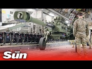 US Forces load Howitzers bound for Ukraine