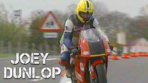 The 1996 Northwest 200 road race review features spectacular action from British road-race kings McCallen, Moodie, Simpson, Coulter, Dunlop, Lofthouse, Duffus and superbike star Terry Rymer. UTV’s cameras zoom in on the best of the superbike, 600, 250 and 125cc races. Buy the Joey helmet t-shirt: https://bitly.ws/Z6bN Our video reviews of this meeting are also acclaimed for their almost terrifying on-bike camera - and 1996 is no exception as we put you in the thick of the action for the sensatio