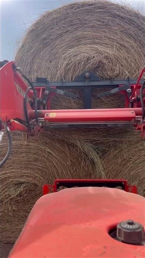 Kubota L2502 Stacking Hay Bales