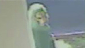 Silent man in werewolf mask shoots worker