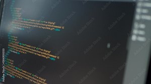 Developer is browsing html code on the computer screen. HTML Web Page Code Scrolling Programming code abstract technology background for software developer and Computer script concept.Scene A.