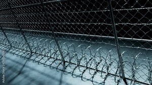 Endless footage showing the whole prison fence at night. Jail protection. 4k HD
