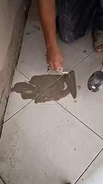 The fastest way to repair tiles that have come loose from the floor without breaking them