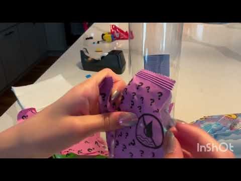 Unboxing a Barbie color reveal mermaid!