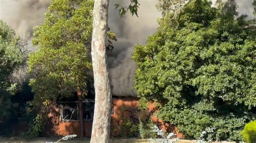 Here is more footage of the black smoke billowing from the former Victoria Police station in Sale this evening. More than 17 CFA (Country Fire Authority) trucks were called out to the fire, and crews are wearing breathing apparatus to fight the fire. Residents nearby are being told to close their windows and doors. There are road closures in place, and police are investigating the cause of the fire. | ABC Gippsland