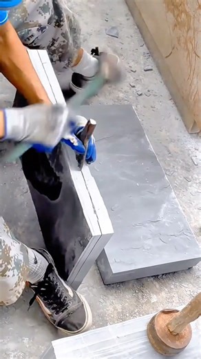 Traditional method of splitting stone for masonry and professional wall plastering