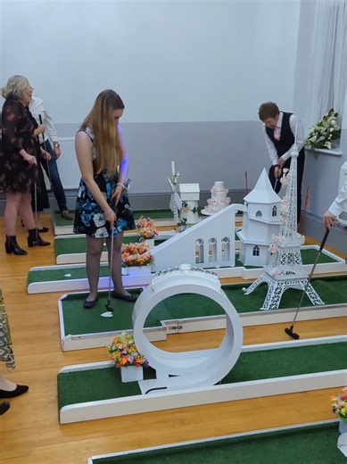 A Wedding Themed Mini Golf Course is a great Hit for keeping your wedding guests entertained. it can be set up inside or outside on the flat lawn space at your wedding venue. #WeddingFun #weddingideas #weddingentertainment #bride #wedding2027