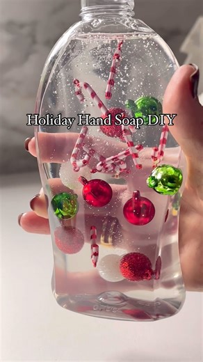 This DIY holiday soap dispenser is so easy and adds the cutest touch of Christmas cheer! All you need is clear hand soap and tiny ornaments. Just pop them in, and you’re ready to impress your guests! I did a Halloween version, and it was a hit, so had to bring it back for Christmas. Have you tried anything like this? Let me know if you give it a go! Comment SHOP below to receive a DM with the link to shop this post on my LTK ⬇ https://liketk.it/4WfHR #ltkholiday #ltkvideo #ltkseasonal . . . . Ho