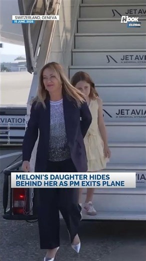 Giorgia Meloni's daughter steals the spotlight by hiding behind her mom