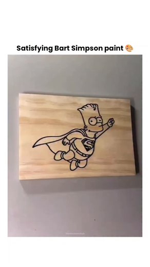 Theviralblendhub on Instagram: "This footage documents the mixed-media creation of a pop-art piece featuring the character Bart Simpson in his "Bartman" alter ego, executed on a wooden substrate. The process begins with the application of a monochromatic base coat using a foam applicator, followed by a masking technique to establish a gradient blue atmospheric background resembling a night sky. The visual narrative peaks during the removal of the primary stencil, a "satisfying" reveal that expos
