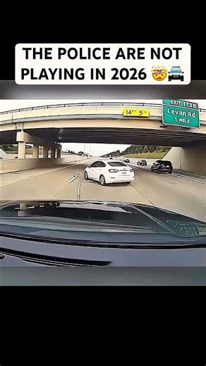 Cop gets car tied up with rope and he tries to drive away and his wheels fall off!